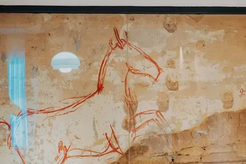Original horse drawing preserved on a historic wall
