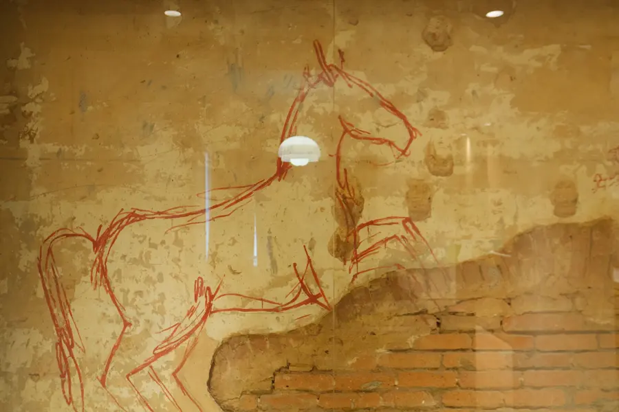 Original horse drawing preserved on a historic wall